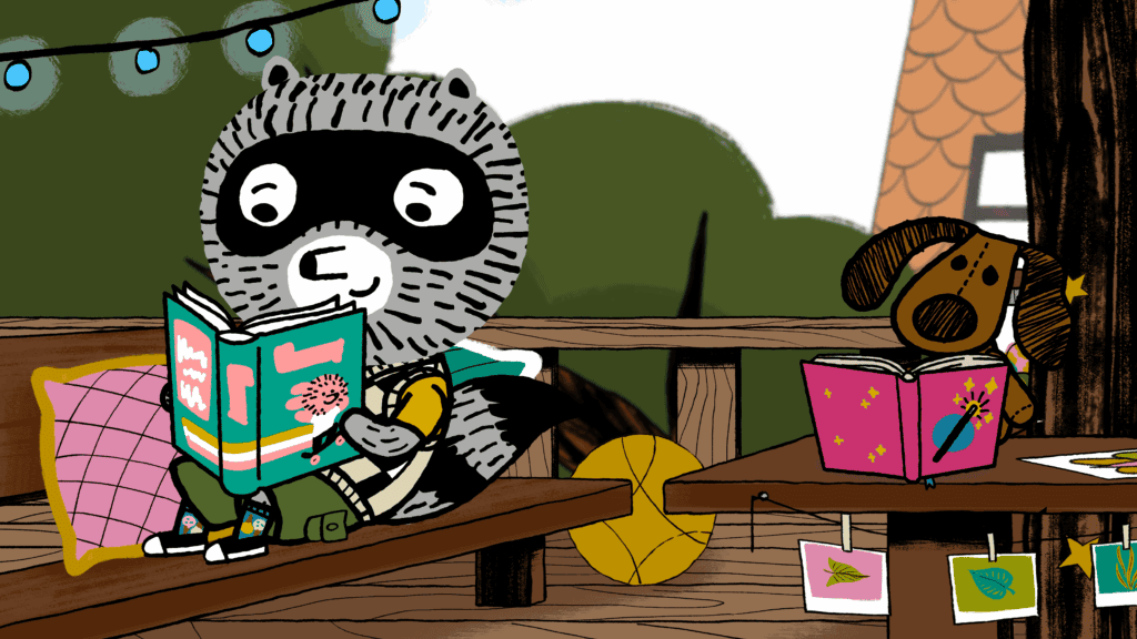Carl, a raccoon, sitting reading a book on a bench next to a dog.