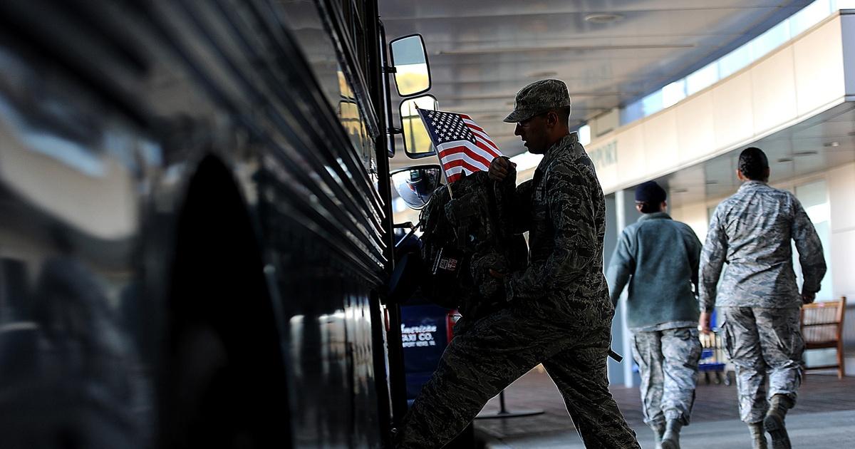Soldier Getting on A Bus