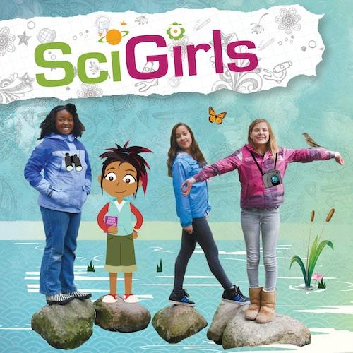 Sci Girls with real girls and an animated character standing together on rocks in a lake.