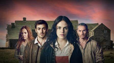 A white woman with long red hair, a white man with short brown hair, a white woman with long Black hair and a white man with short gray hair stand in a row looking at the camera.