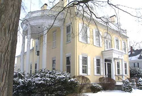 Canandaigua Main St. Mansion with light on for a son who will never come home