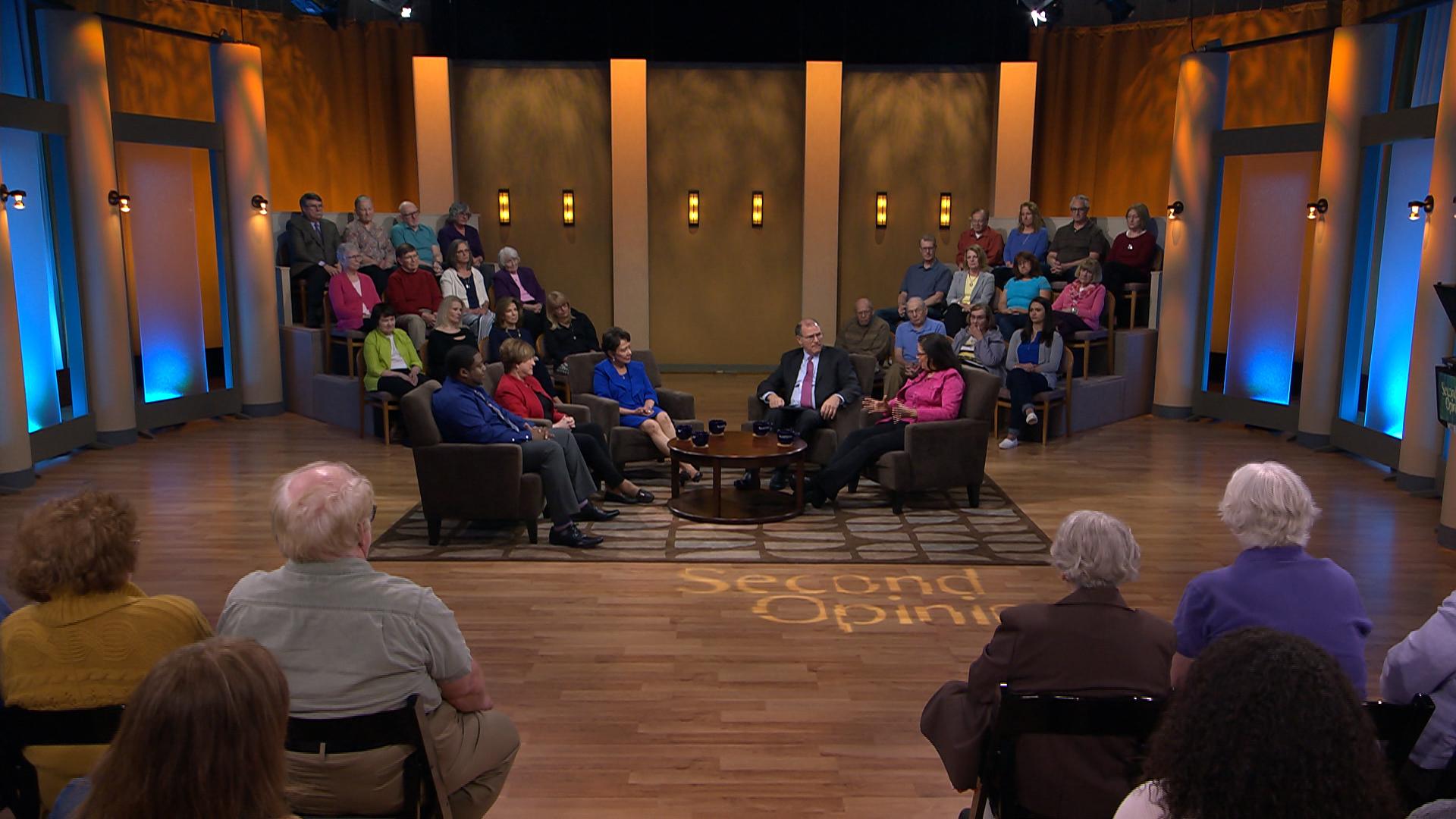 Studio audience and series panel in studio for a WXXI production