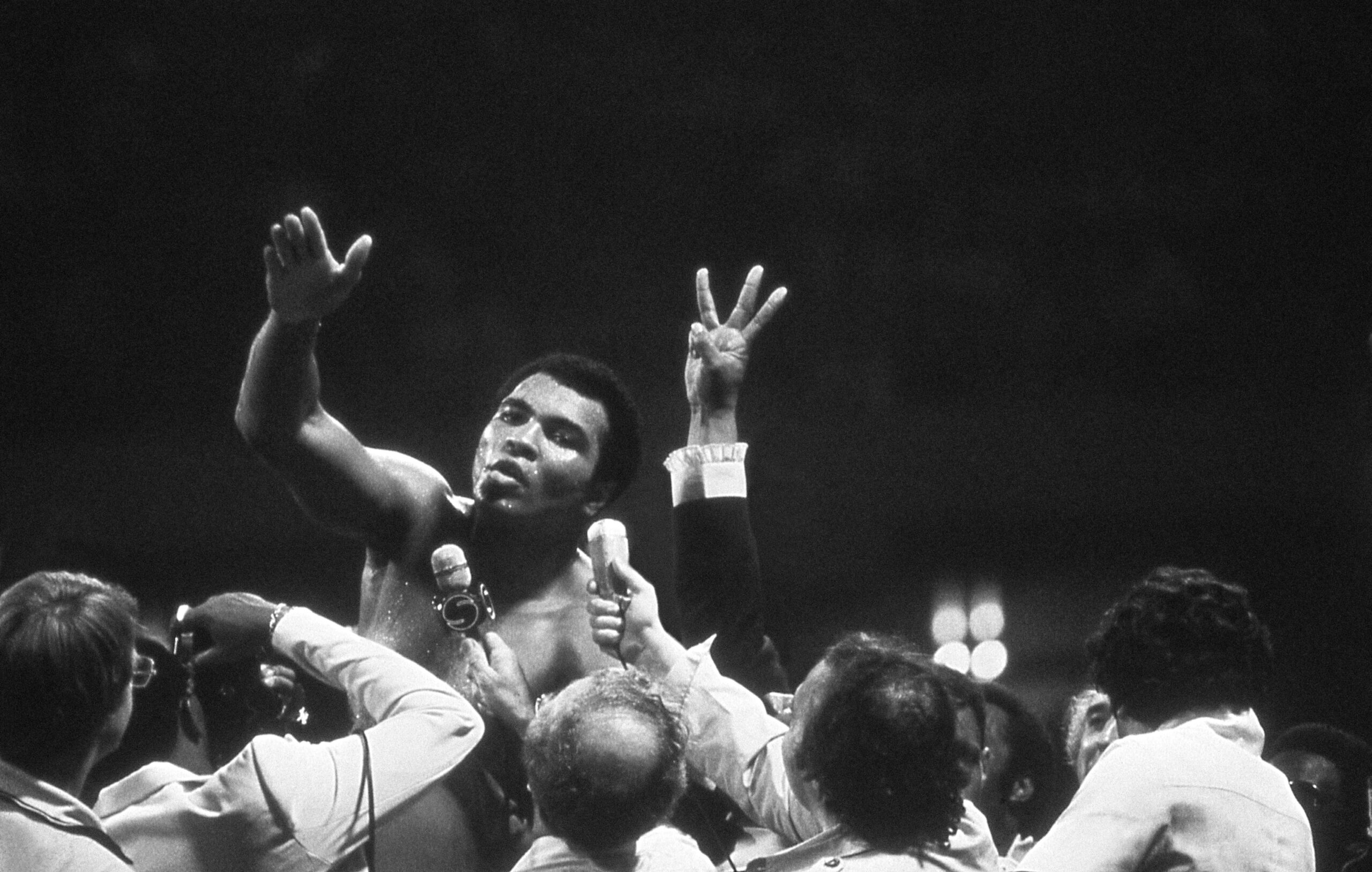 Muhammad Ali talks with the press after winning back the Heavyweight Championship for an unprecedented third time Credit: Courtesy of Michael Gaffney