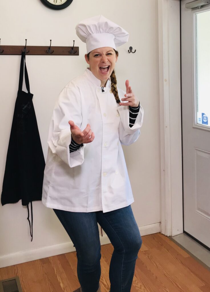 Host Jen Indovina in a chef outfit