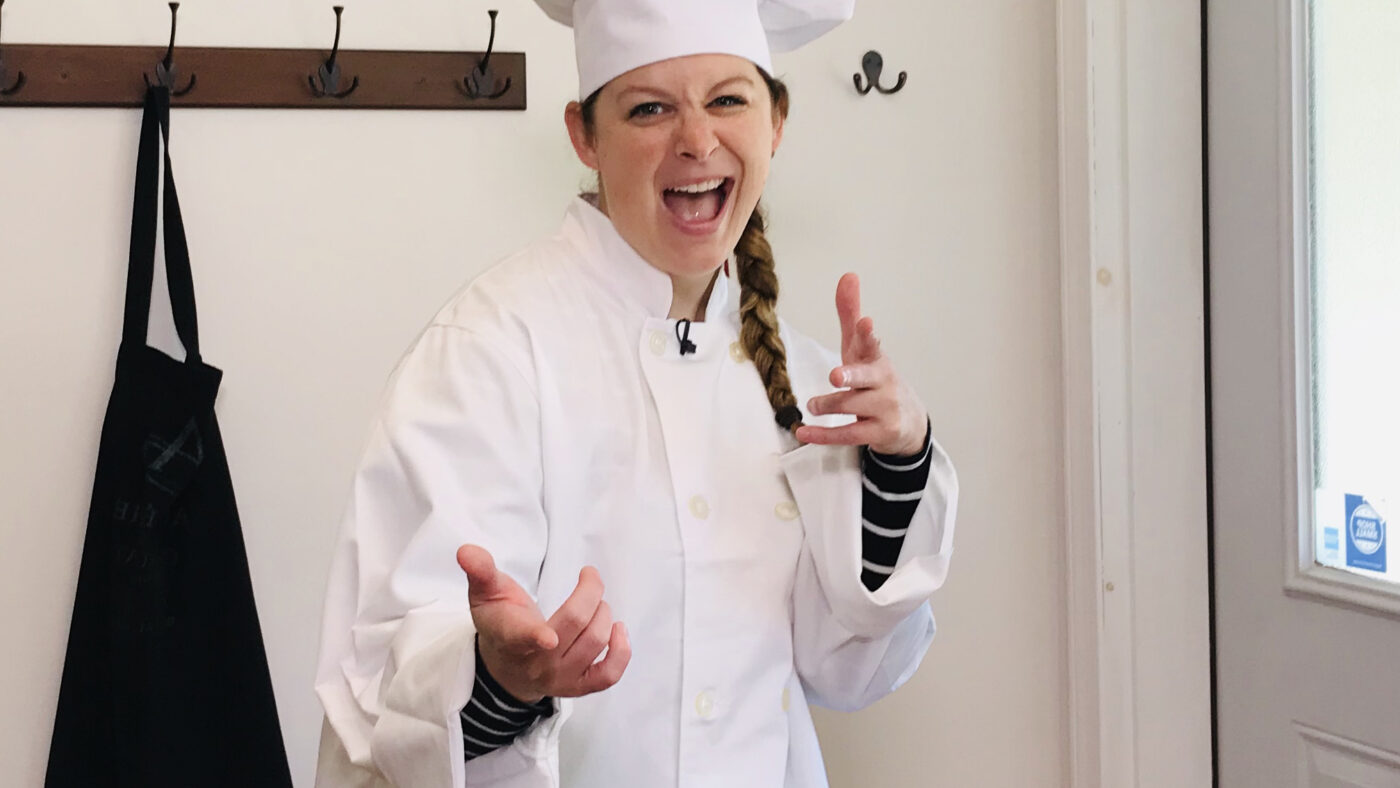 Jen in a chef hat
