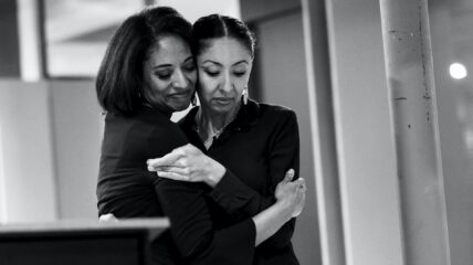 Two women hugging