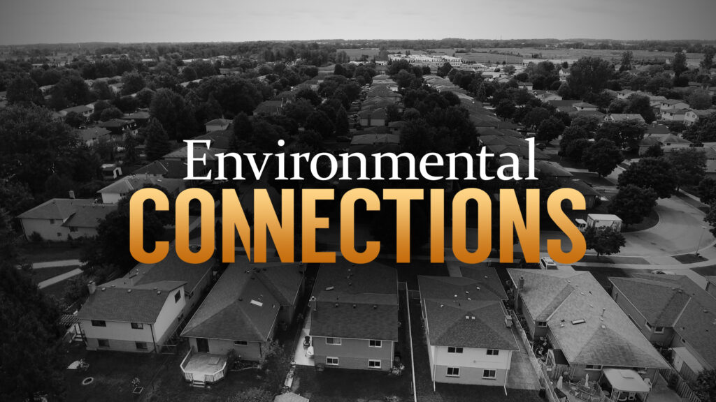 Title card with type that reads Environmenta,l in white type and Connections, in yellow type over a photo of an aerial shot a row of houses