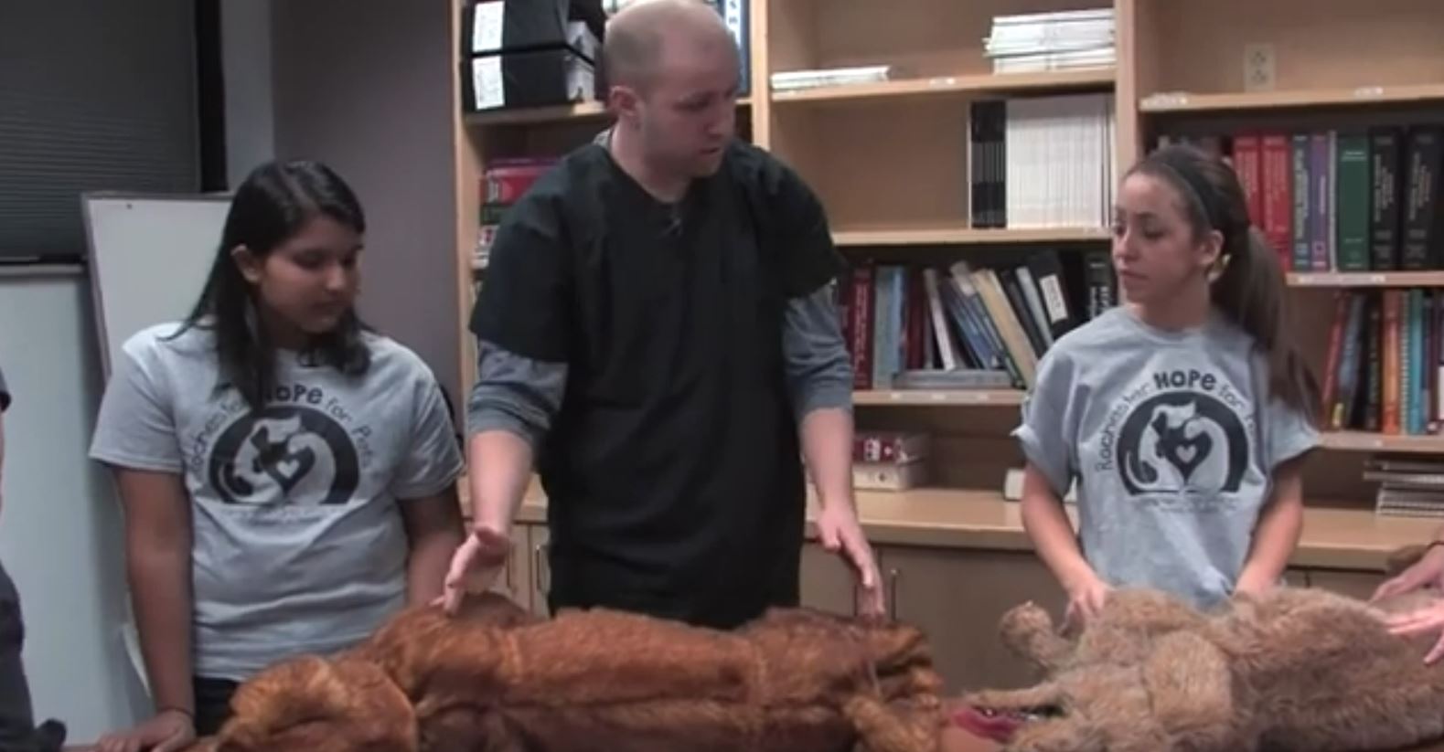 Vet Tech Explorers learning about Canine CPR from a vet