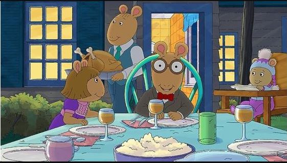 Arthur, DW and Baby Kate at a Thanksgiving dinner table with Dad in the background