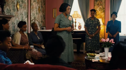 A group of Black women gathered in a room.