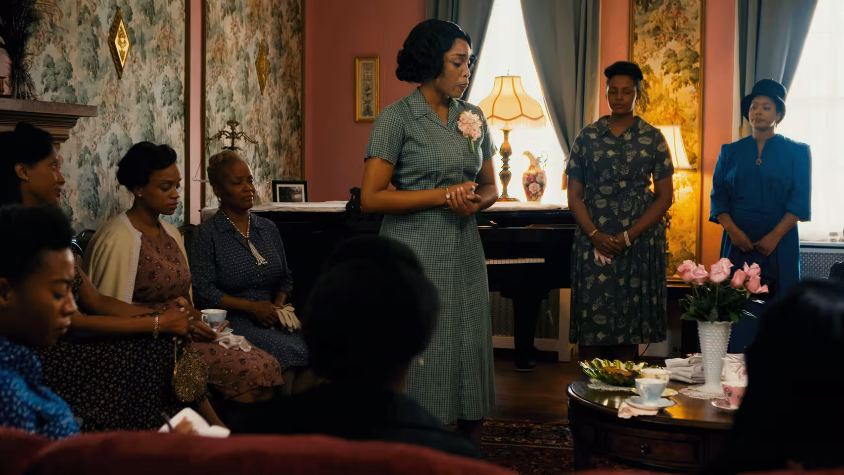 A group of Black women gathered in a room.