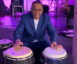 Víctor Antonelli Sr. playing congas.