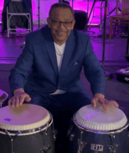 Víctor Antonelli Sr. playing congas.