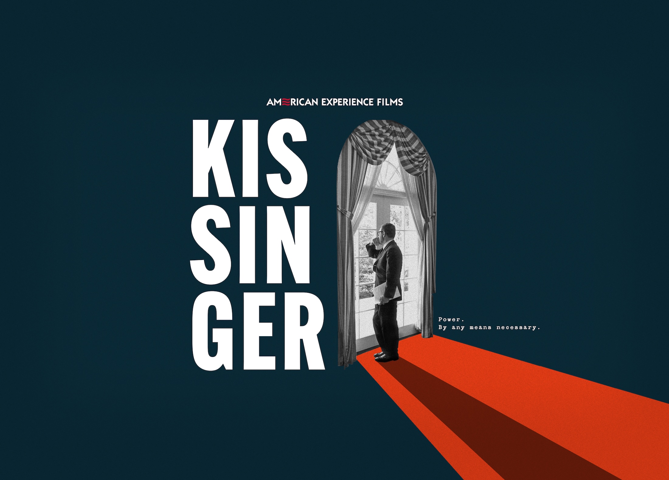 Kissinger looking out a window, standing on a red carpet