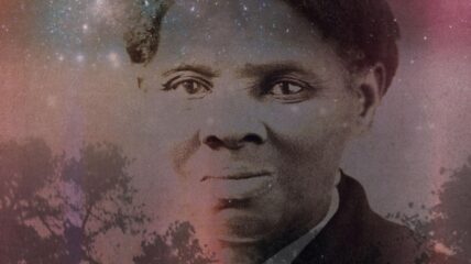 Sepia tone photo of Harriet Tubman with trees in the background
