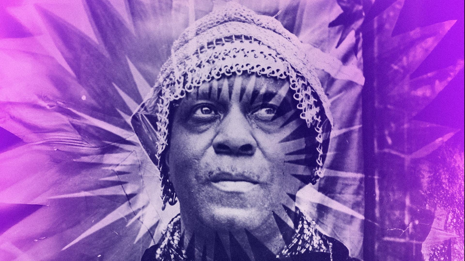 Sun Ra wearing a crown with illustrated purple sun rays around him