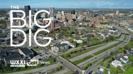 An aerial shot of Rochester's Inner Loop. Copy in white reads: The Big Dig with GBH and WXXI logos