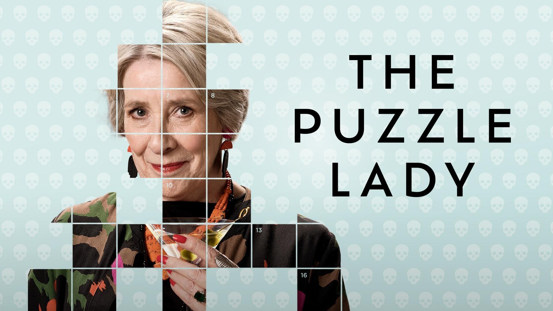A composite image of an older white woman with short blonde hair, divided into overlapping square tiles, creating a puzzle‑like effect. The person holds a small drink near the center of the image. On the right side, large black text reads ‘THE PUZZLE LADY’ against a sea foam colored background with white pattern of skulls background