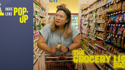 The host, an Asian woman with long brown hair wearing a light blue blouse pushes a grocery cart in a grocery store. Copy in yellow reads: The Grocery List Show from Indie Lens Pop-up