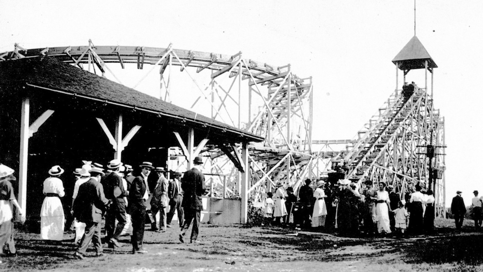 Seabreeze Park Figure Eight roller coster with a bunch of people around it.